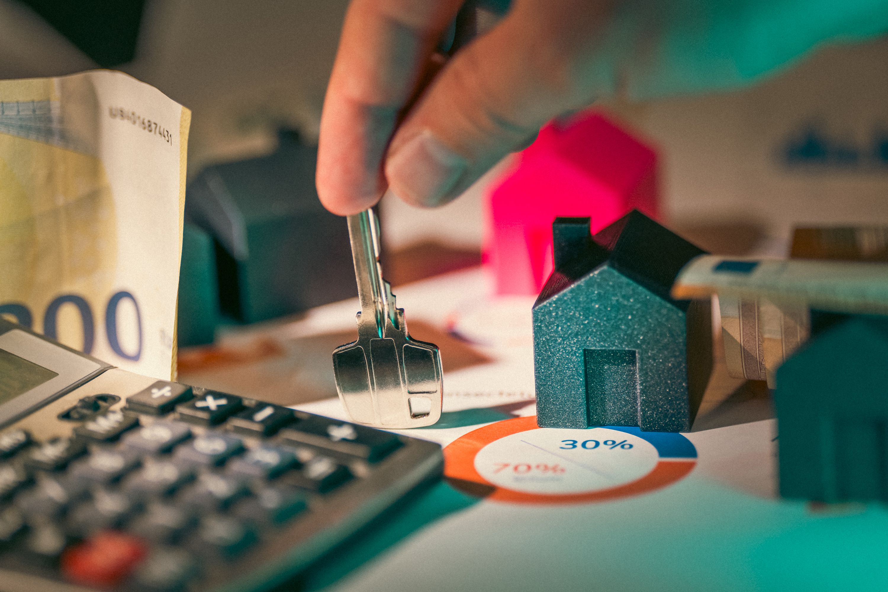 Woman calculating mortgage refinance options at home.